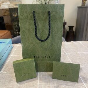 Brand new Gucci store bag and box